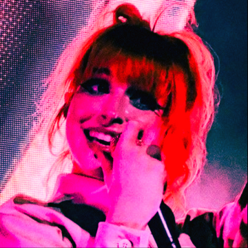 Hayley Williams holding a microphone.